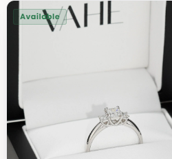White natural diamond three-stone ring